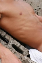 Hairy cock/asshole twink posing on a construction site