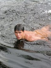 Brunette twink goes skinny dipping and masturbates