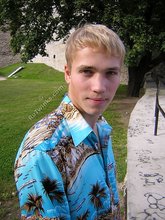 Big-dicked twink boy posing in Hawaiian shirts outdoors