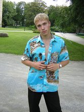 Big-dicked twink boy posing in Hawaiian shirts outdoors