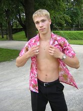 Big-dicked twink boy posing in Hawaiian shirts outdoors