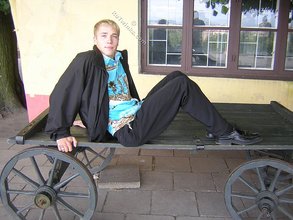 Big-dicked twink boy posing in Hawaiian shirts outdoors