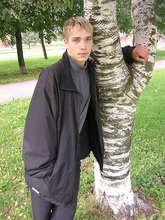 Big-dicked twink boy posing in Hawaiian shirts outdoors