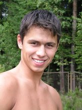 Big-dicked twink brunette posing in the forest naked