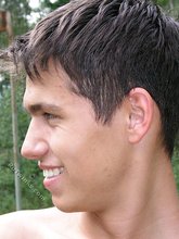 Big-dicked twink brunette posing in the forest naked