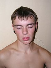 Dark-haired twink face-fucking an older dude on cam