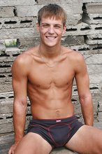 Undies-wearing twink finally shows off his pale ass