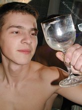 Big-dicked young boy cums inside of a glass in the bathroom