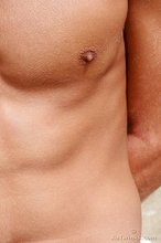 Shredded twink slowly putting his clothes back on