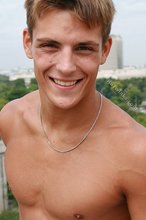 Shredded twink slowly putting his clothes back on