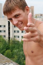 Shredded twink slowly putting his clothes back on