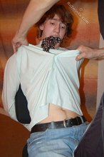 White shirt long-haired twink takes his captor's meaty cock