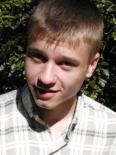 Young-looking blonde twink whips out his cock outdoors