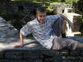 Young-looking blonde twink whips out his cock outdoors