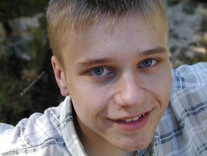 Young-looking blonde twink whips out his cock outdoors