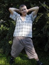 Young-looking blonde twink whips out his cock outdoors