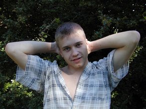 Young-looking blonde twink whips out his cock outdoors