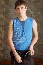 Gay twink does artistic posing with his dong out