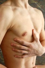 Dark-haired and jacked-up twink shows his hairy cock