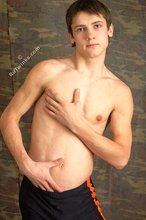 Dark-haired and jacked-up twink shows his hairy cock