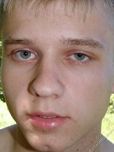 Blue-eyed twink boy stroking his hairy cock on camera