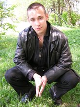 Black pants twink boy is posing indoors and outdoors