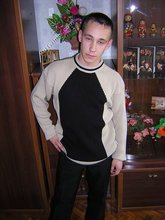 Black pants twink boy is posing indoors and outdoors