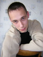 Black pants twink boy is posing indoors and outdoors