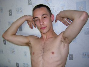 Black pants twink boy is posing indoors and outdoors