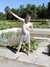 Pale and blond-haired twink gets his naked ass on the grass