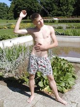 Pale and blond-haired twink gets his naked ass on the grass