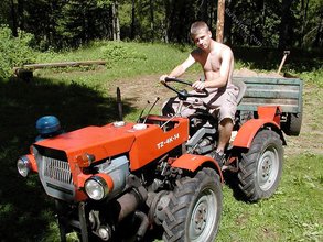 Horny twink with a hairy cock posing naked outdoors