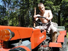 Horny twink with a hairy cock posing naked outdoors