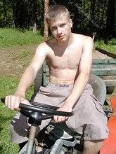Horny twink with a hairy cock posing naked outdoors