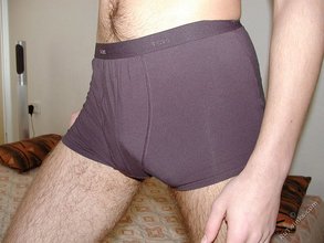 Sexy stud with brown eyes showing off his meaty cock