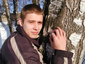 Pasty twink boy posing outdoors in his winter coat