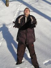 Pasty twink boy posing outdoors in his winter coat