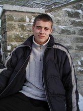 Pasty twink boy posing outdoors in his winter coat