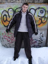 Pasty twink boy posing outdoors in his winter coat