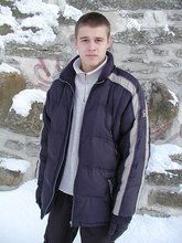 Pasty twink boy posing outdoors in his winter coat