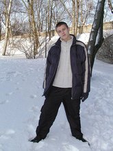 Pasty twink boy posing outdoors in his winter coat