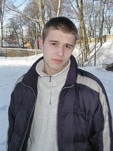 Pasty twink boy posing outdoors in his winter coat
