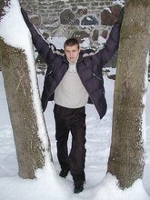 Pasty twink boy posing outdoors in his winter coat