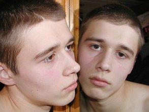 Beautiful twink boy makes out with his own reflection