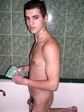 Young twink showering after he came hard on camera