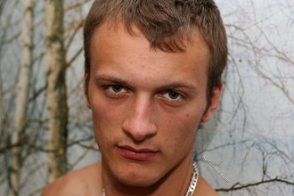 Pretty-looking twink masturbating while on all fours