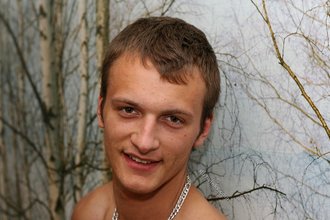Pretty-looking twink masturbating while on all fours