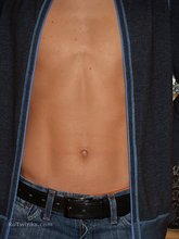 Baggy jeans teen twink undressing next to a door