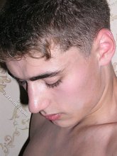 Blue-eyed twink takes off his jeans and grabs his own ass