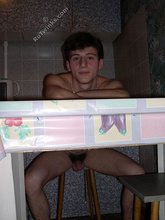 Dark-haired twink stroking his cock, alone at night
